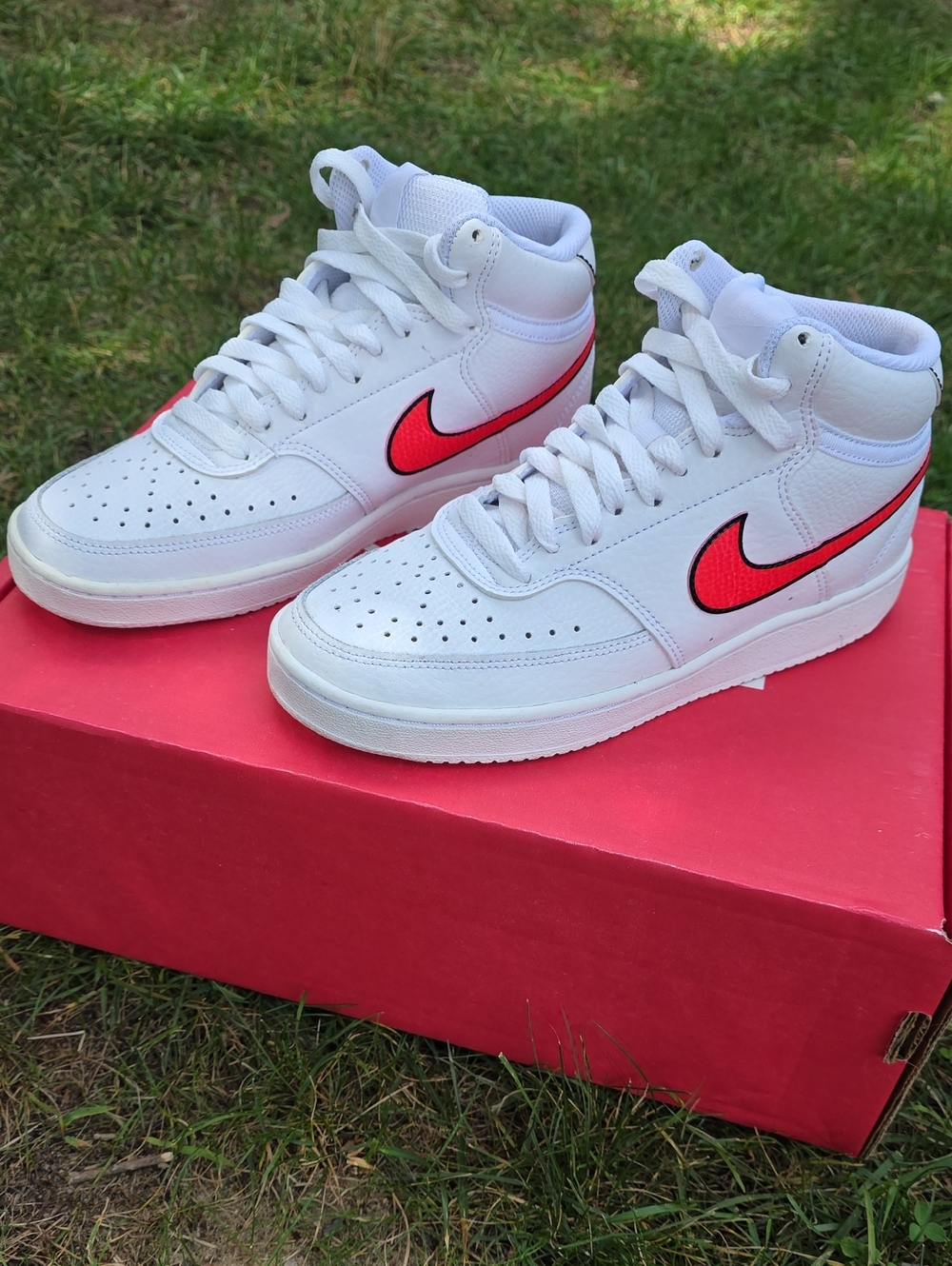 Nike White High-Top Sneakers with Red Swoosh